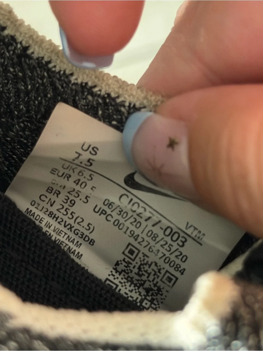 Nike Black and White Knit Slip-On Sneakers